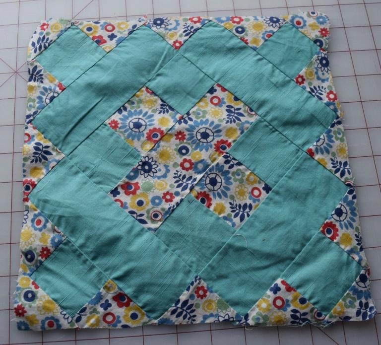 1 1930's Chimney Sweep quilt block, turquoise and floral