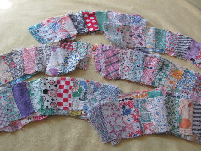 81 hand stitched Double Wedding Ring quilt blocks 1930's prints
