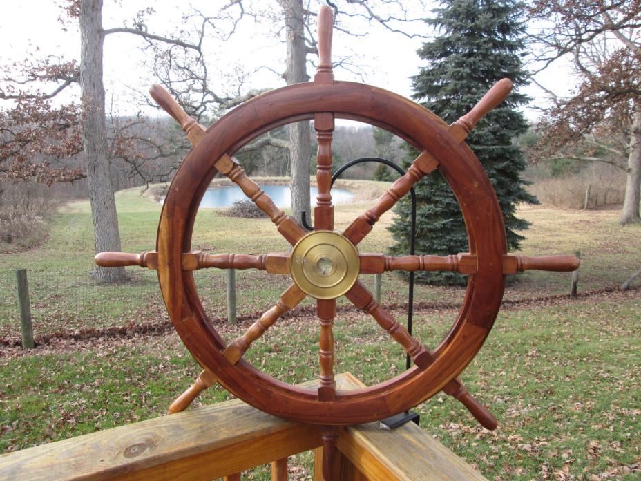 VINTAGE LARGE SHIPS WOODEN AND BRASS STEERING WHEEL. 41