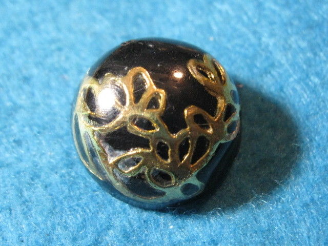 Modern Button: Plastic with a Metal Overlay