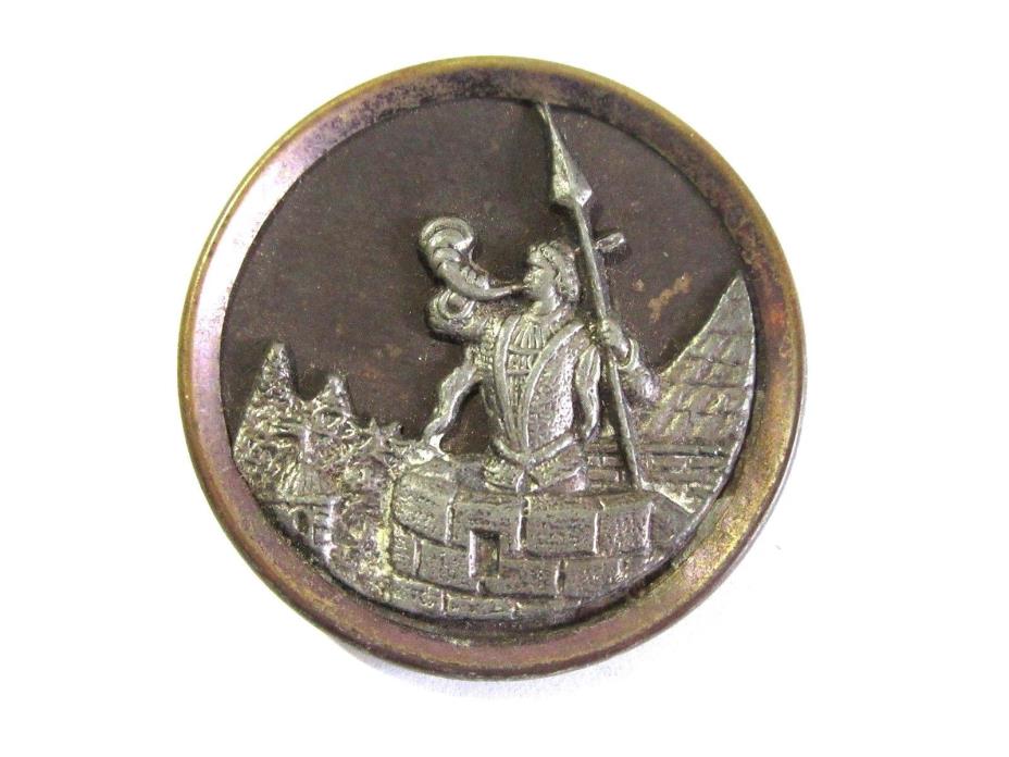 LARGE BRASS ANTIQUE BUTTON METAL MAN BLOWING HORN AT CASTLE 1 1/2