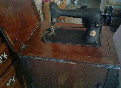 Antique singer sewing machine with table