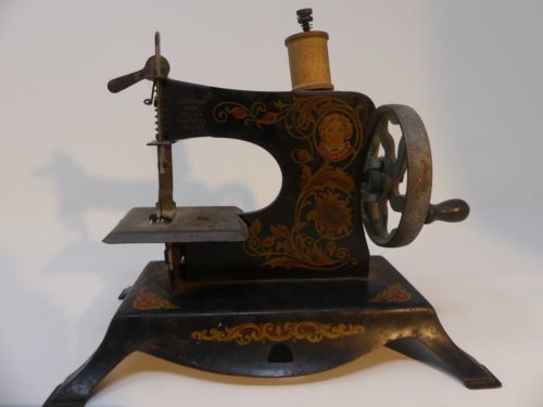 Little Miss Lindstrom Antique Toy Sewing Machine Metal