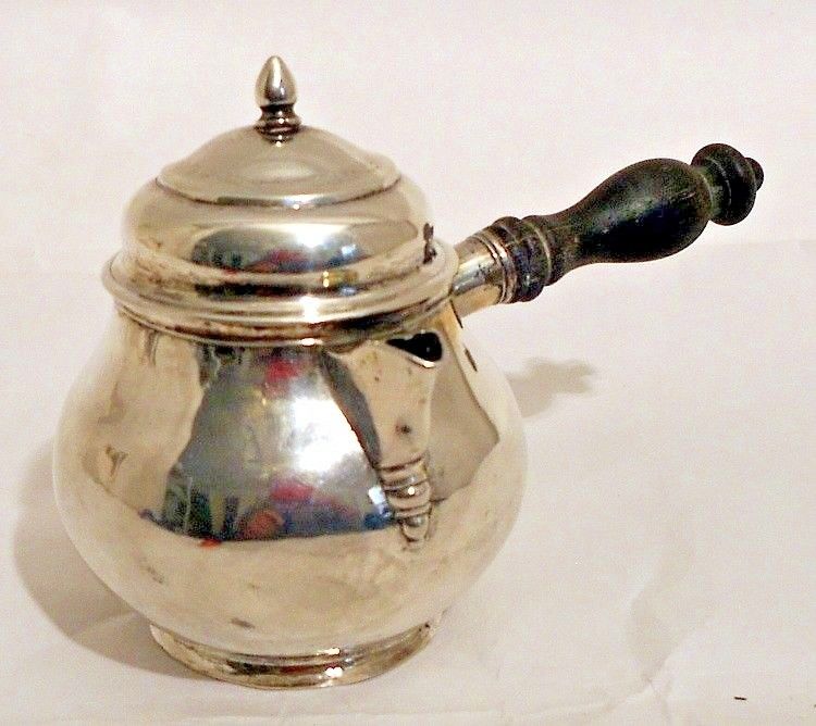 An early coin silver covered brandy saucepan, American c.1750