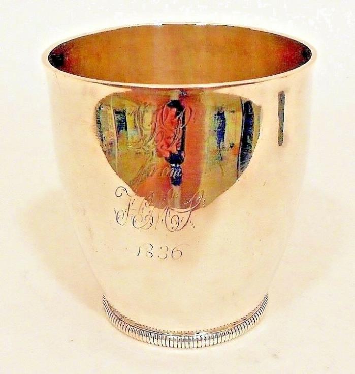 A small unseamed coin silver beaker, by William Moulton IV, Newburyport, MA.