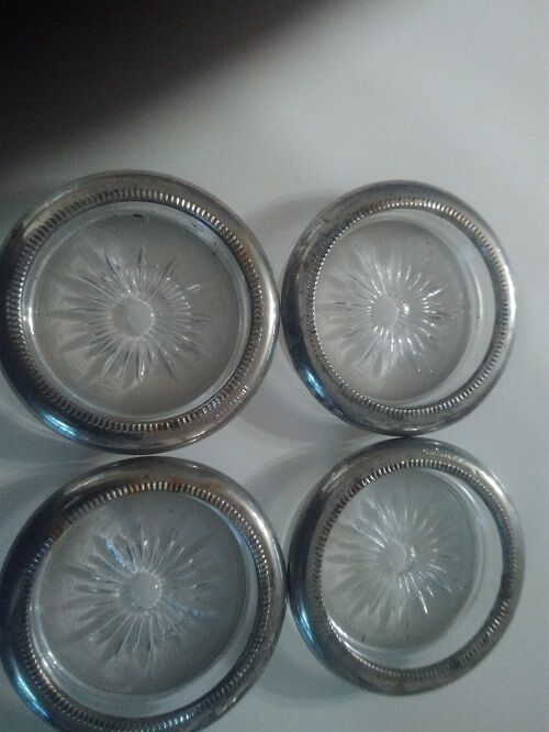 silver platted coasters made in Italy 4 of them