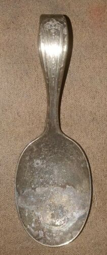 Tudor plate Oneida Community made spoon with curled handle not cleaned