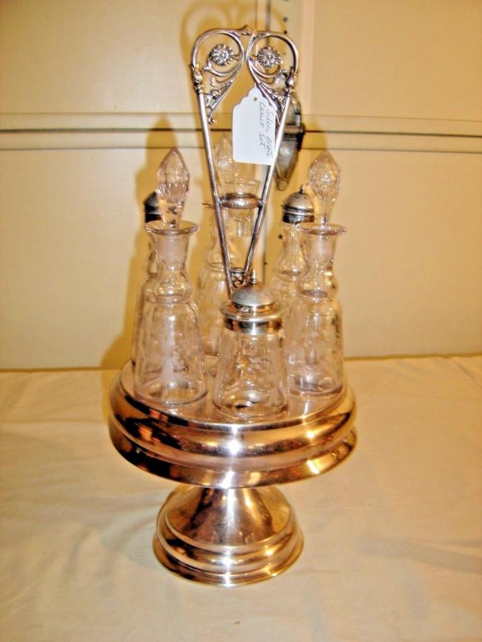 Silver Plate Lazy Susan Castor Holder with 6 matching etched castor bottles 9267