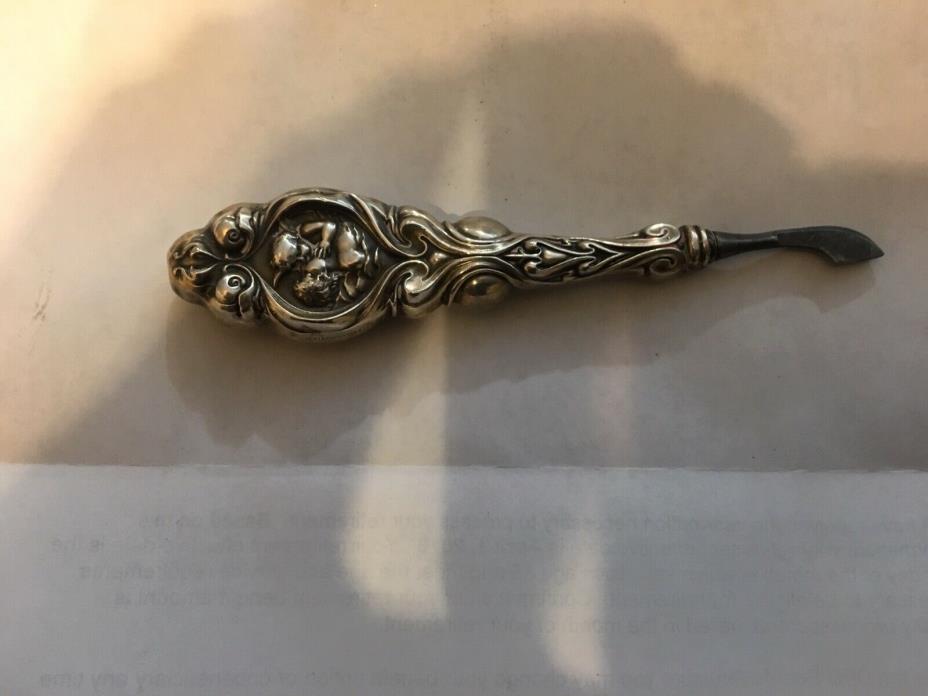 Art Nouveau Cuticle Tool Kissing Couple Woman and Winged Figure Sterling Silver