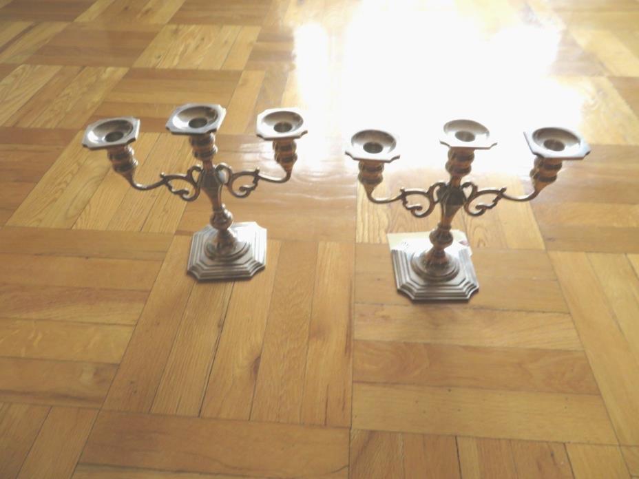 A Pair of Antique Black, Starr and Gorham Sterling Silver Candle Holders