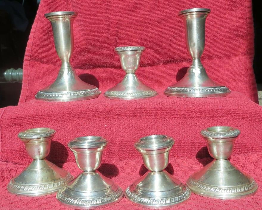 Lot of 7 Crown sterling silver reinforced with cement candle sticks
