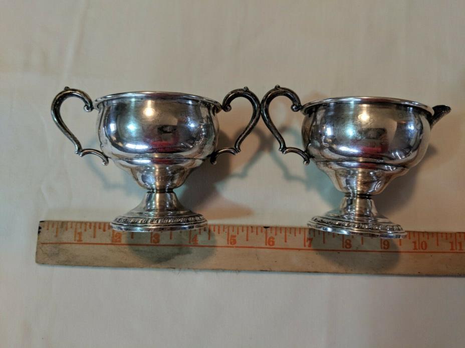 La Pierre sterling silver weighted cream and sugar bowls.