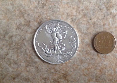 Very cool large heavy Solid Sterling silver Archangel demon battle scene coin