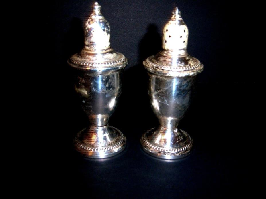 .ELEGANT DUCHIN STERLING SILVER AND PEPPER GLASS LINED SHAKERS