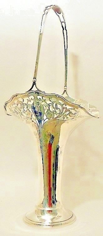 A tall flared sterling bride's basket, Frank Whiting Co., c.1916.