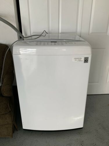 LG washing machine WT1501CW white top loader Good condition. (Needs Repair)