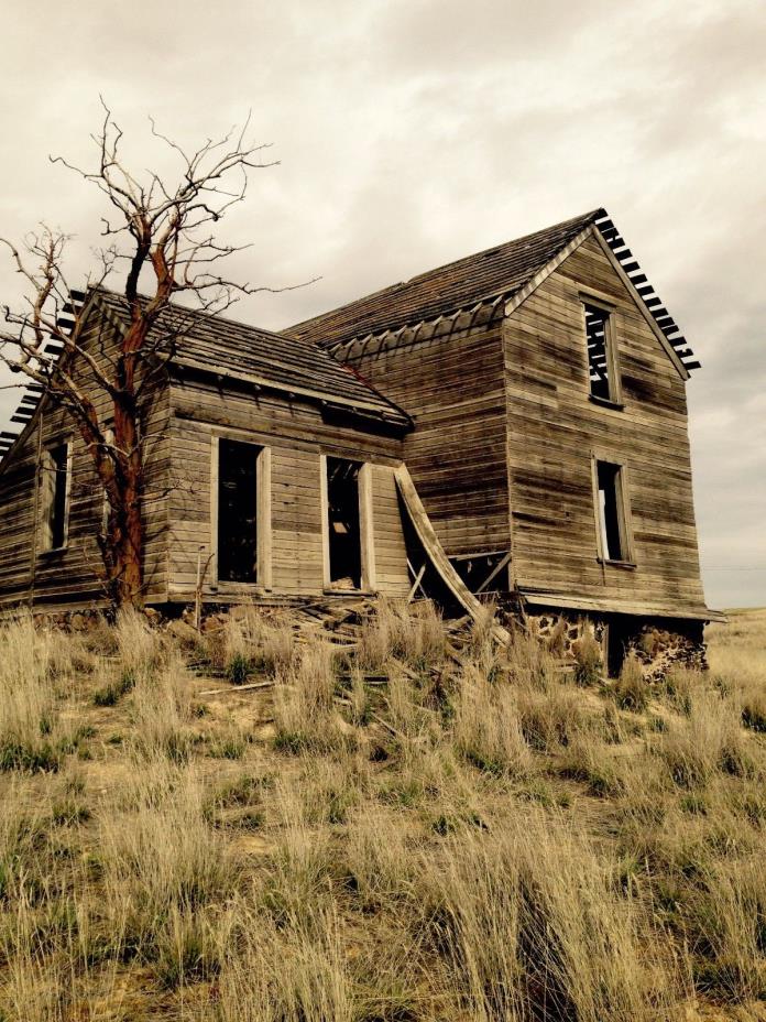 Haunting landscape homestead mounted photo