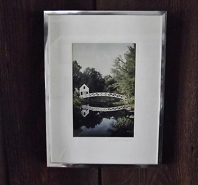 ONE framed Chuck Theodore photo.Title 