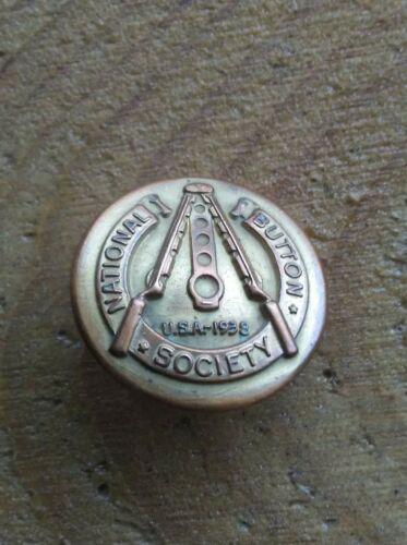 Vintage 1938 metal National Button Society button made by B.B.Co.