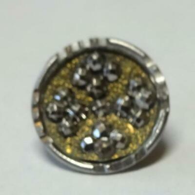 Small vintage metal button with a steel cut cross design