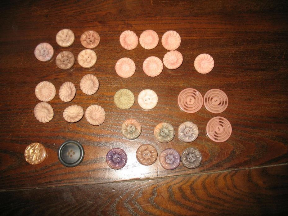 VINTAGE LOT OF 30 BUTTERSCOTCH TONES CELLULOID? BUTTONS W/CARVED & SWIRL DESIGNS