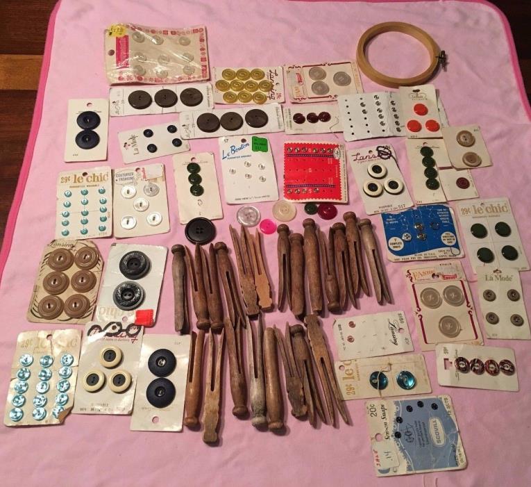 LOT 21 WOODEN CLOTHES PINS, 28 CARDS OF BUTTONS, SNAPS, WOODEN RING