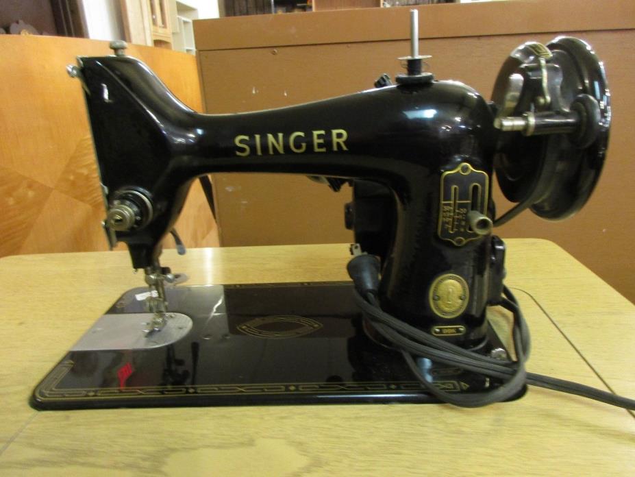Singer 99K sewing machine in cabinet