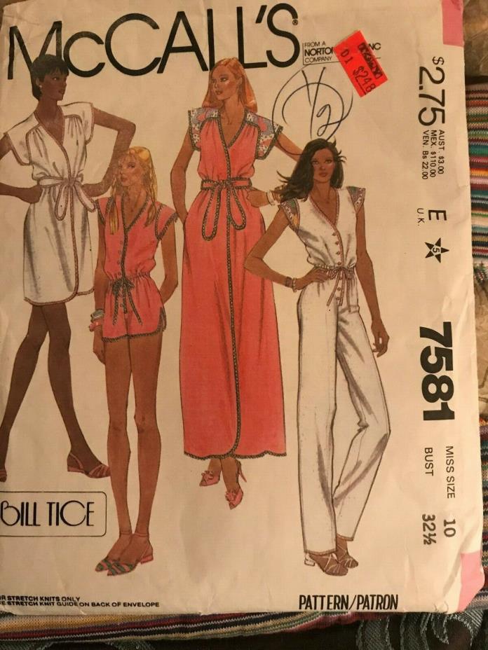 McCall's pattern 7581 Ladies Cover up size 10 cut out of stripped Knit fabric