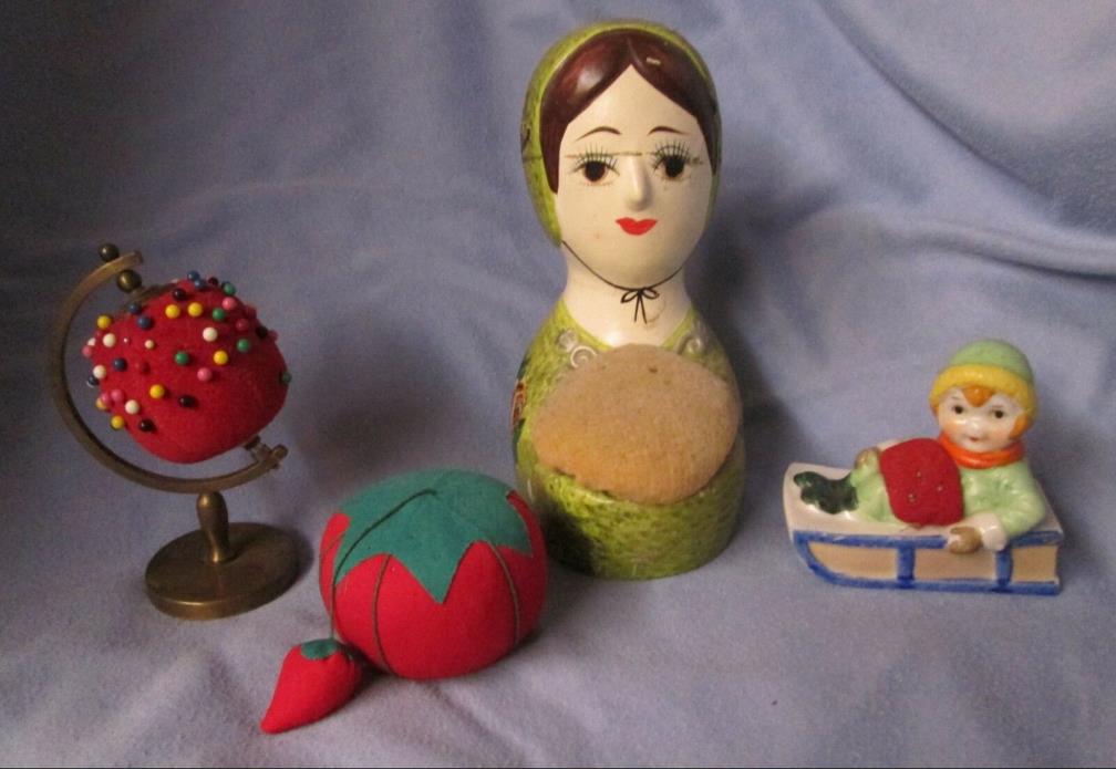 lot of 4 vintage pin cushions - lady, boy in sled, globe & strawberry