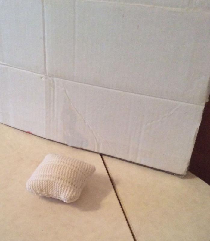 handmade white knitted pin cushion