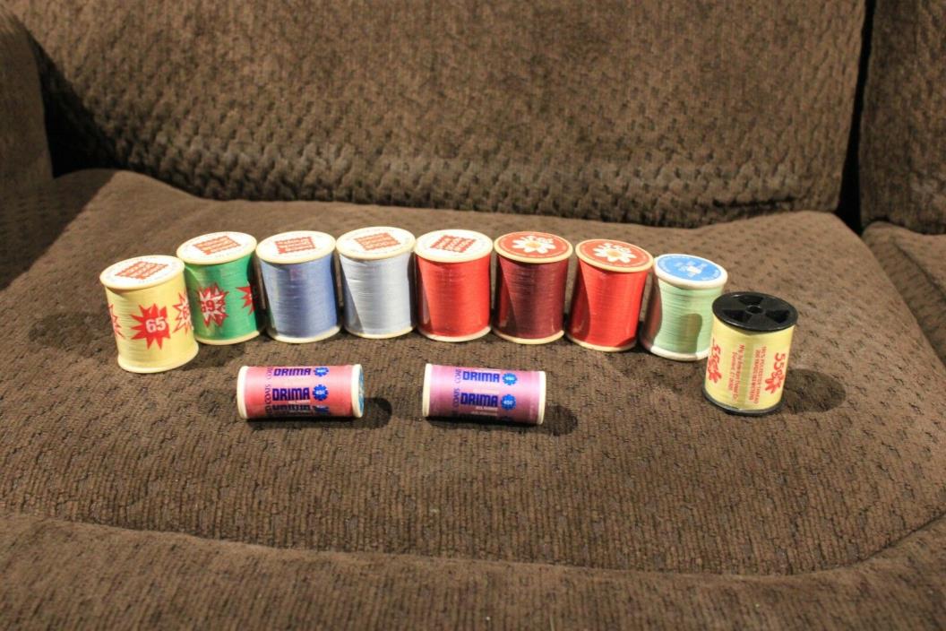 11 UNOPENED SPOOLS OF THREAD, VARIOUS COLORS