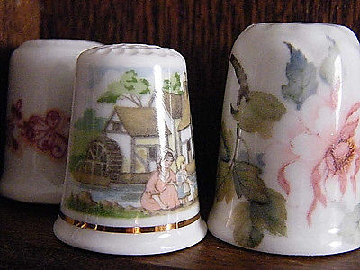 Lot  of  3 flowers  thimbles  from the Thimble Collectors Club + info cards