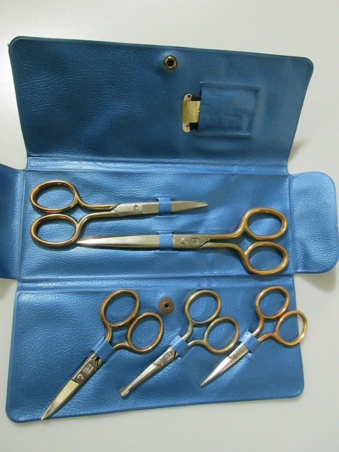 Vintage German Made Scissors 5 pc Set Blue Case Palm Tree Imprint Gold Handles