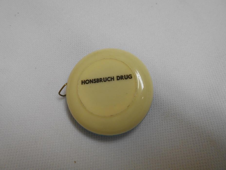 vintage celuloid ? Honsbruch Drug Aurelia Iowa sewing tape measure