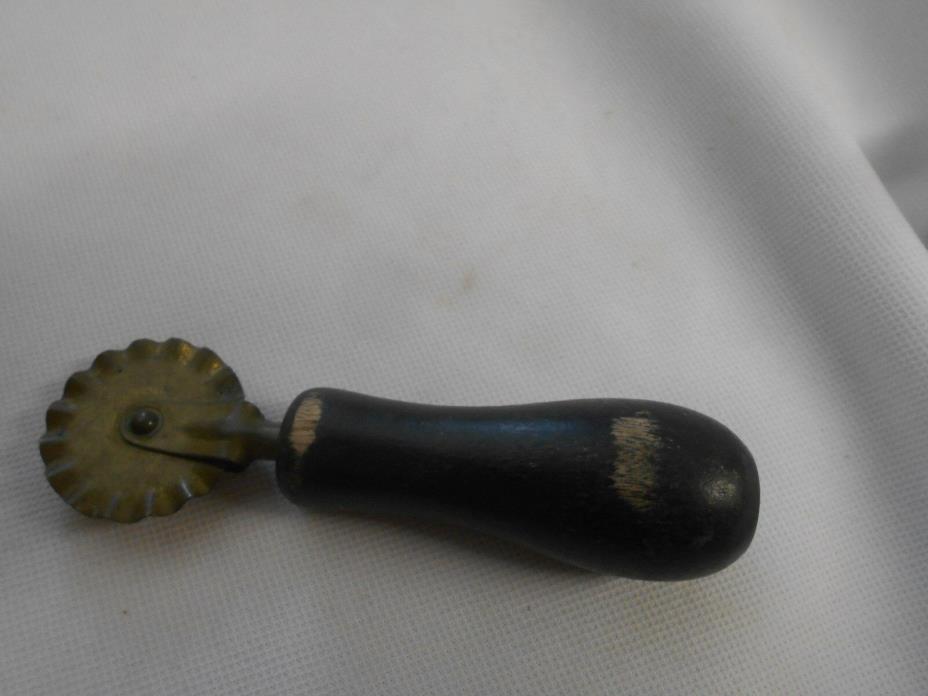 vintage brass & wood pastry cutter ? sewing fabric marker ? tool