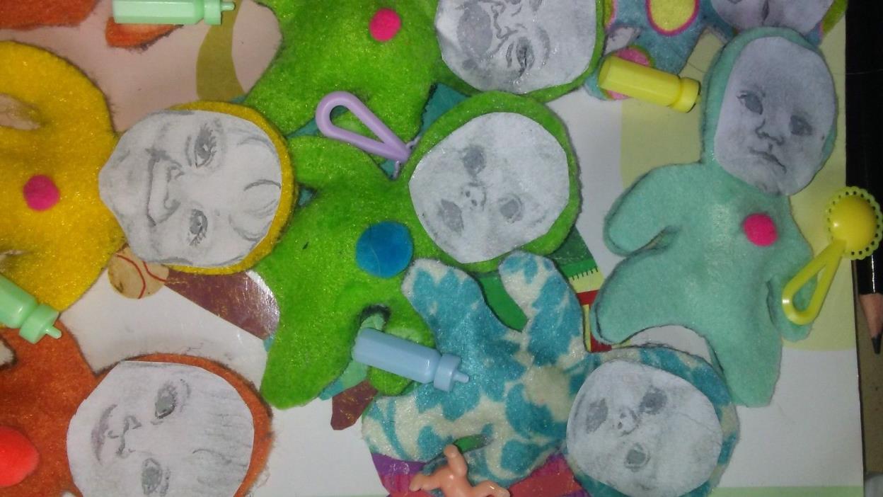 Handcrafted Little Dolls With Drawn Faces