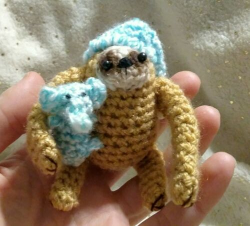 Sleepy Sloth - crochet amigurumi handmade sloth in nightcap with toy elephant