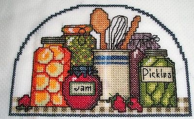Finished cross stitch piece-Putting up Preserves