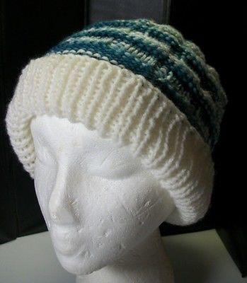 Hand knit womens slouch style hat white with blue variegated