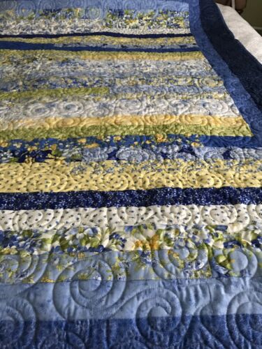 Twin Quilt Jellyroll blue yellow green print 65x76 flannel back blue & white