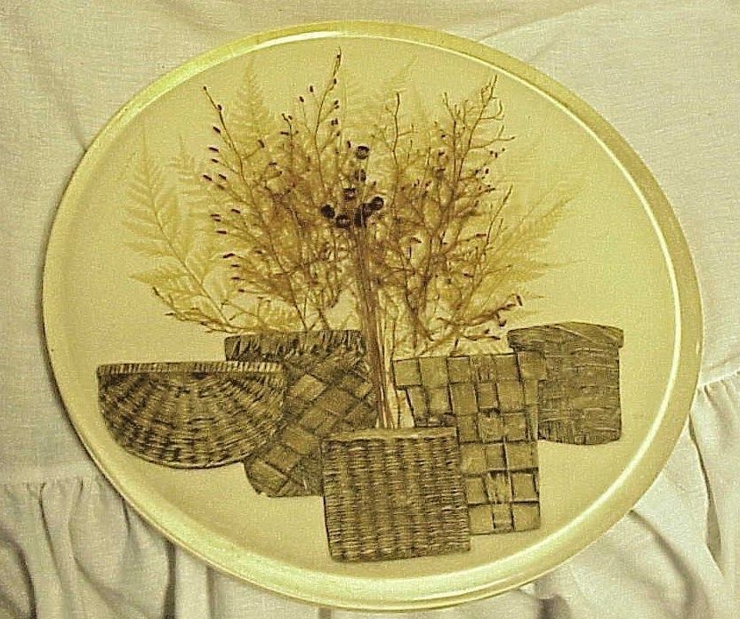 PRESSED  DRIED FLOWERS AND FERN  WITH BASKETS IN BAKELITE ?