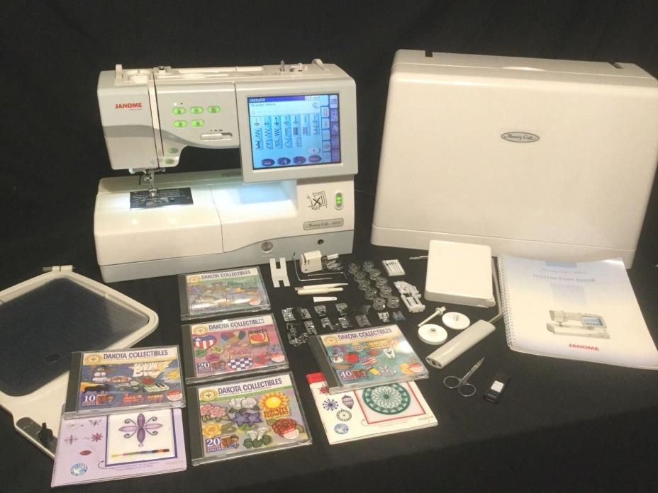 Janome Memory Craft 11000  Sewing/Embroidery Machine 5 Design CDs