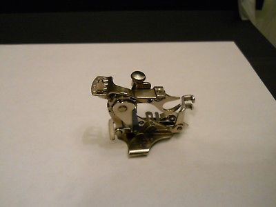 Singer sewing machine replacement part #1261 - adjustable ruffler (pre-owned)