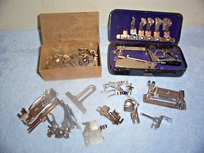 LOT OF 25-30 VINTAGE METAL SEWING MACHINE ATTACHMENTS WITH ORIGINAL BOXES