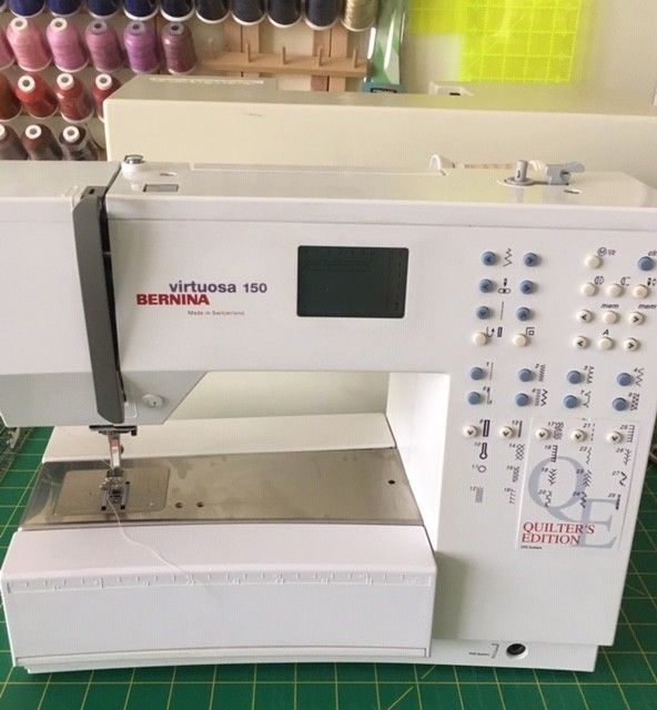 Bernina Virtuosa 150QE Quilters Edition sewing machine with extension table
