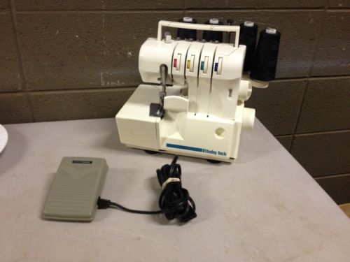 Baby Lock Model #BL400 Serger Sewing Machine with pedal and instructions (a42)