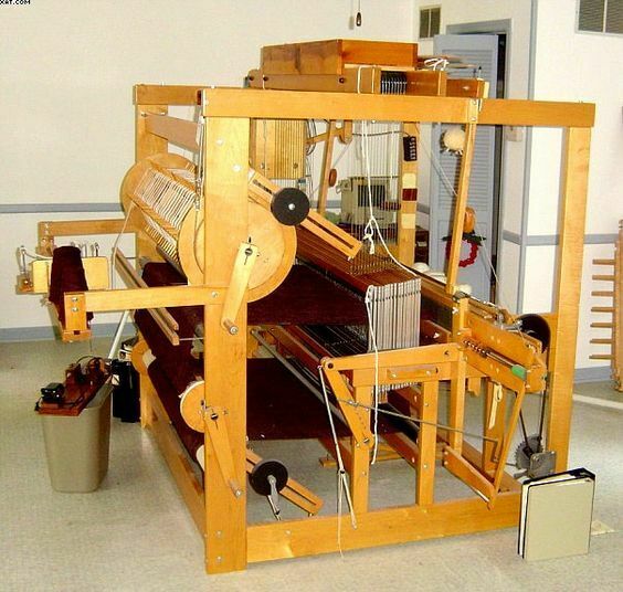 Older model AVL16 harness weaving loom.