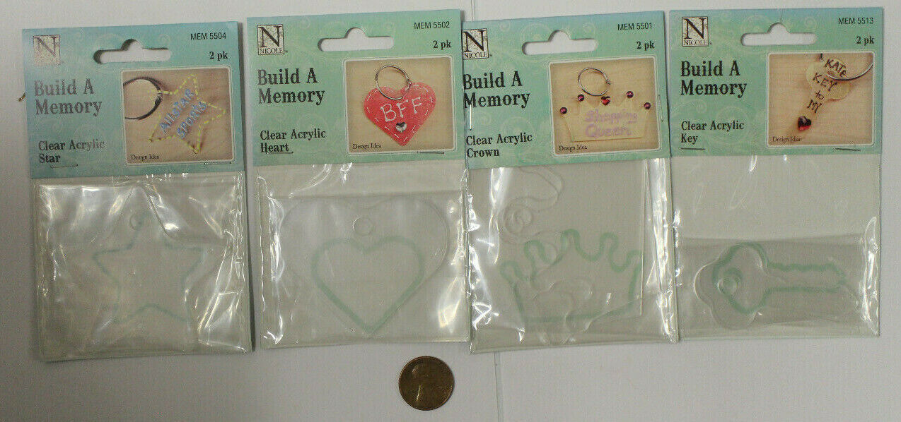 4 Packages of Clear Acrylic Shapes, Crown, Heart, Star, and Key.  2 pcs. Each.