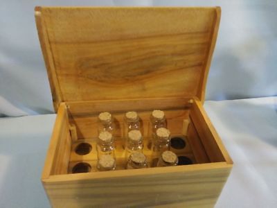 wooden box with glass vials