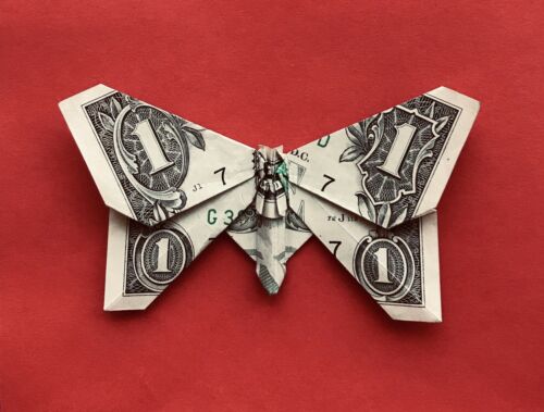 Origami Dollar Butterfly Made Of A Folded One Dollar Bill. More Available